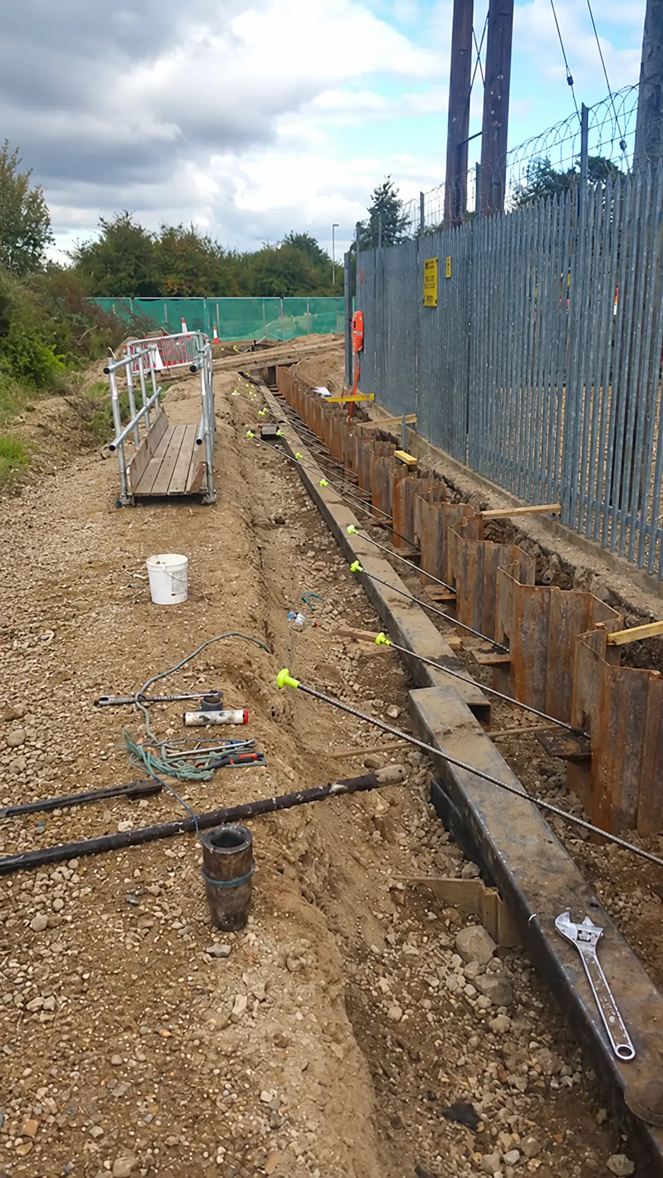 New sheet piles and tie bars beside the substation boundary