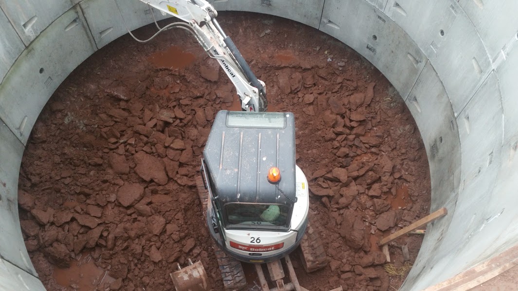 Excavation inside the concrete-lined shaft at Crick Road, Caldicot