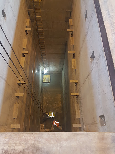 View into the deep rectangular caisson shaft